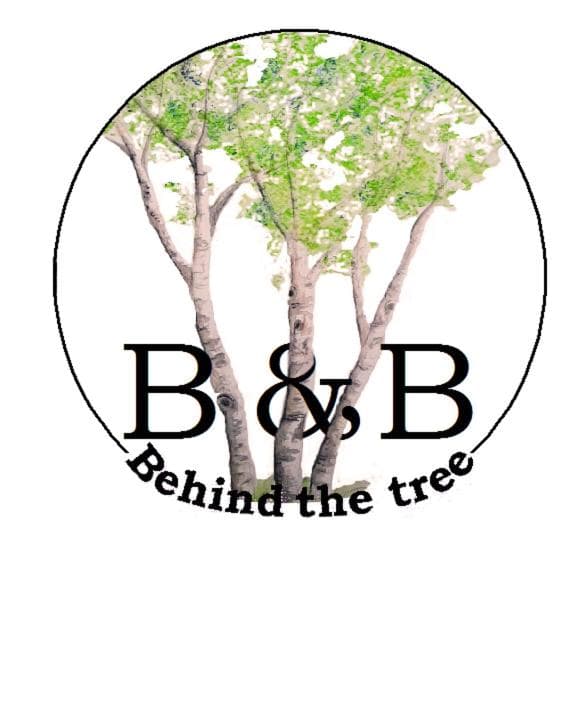 B&B behind the tree