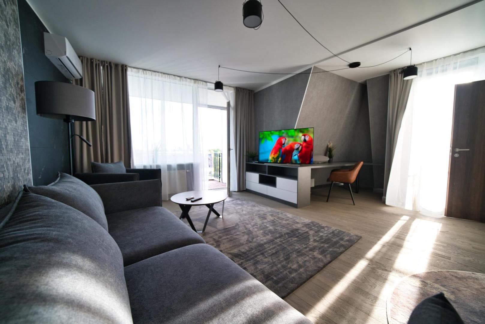 Modern Central Riga Apartment with Balcony, Gym, Parking & AC