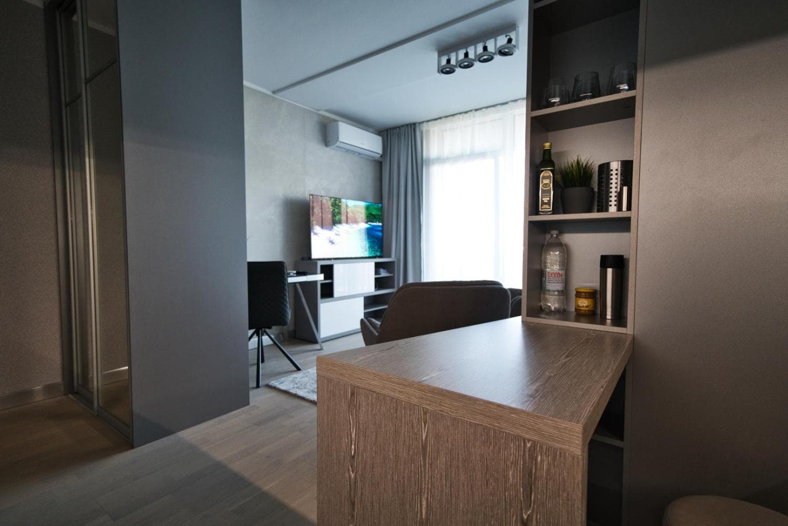 Modern Central Riga Apartment with Balcony, Gym, Parking & AC
