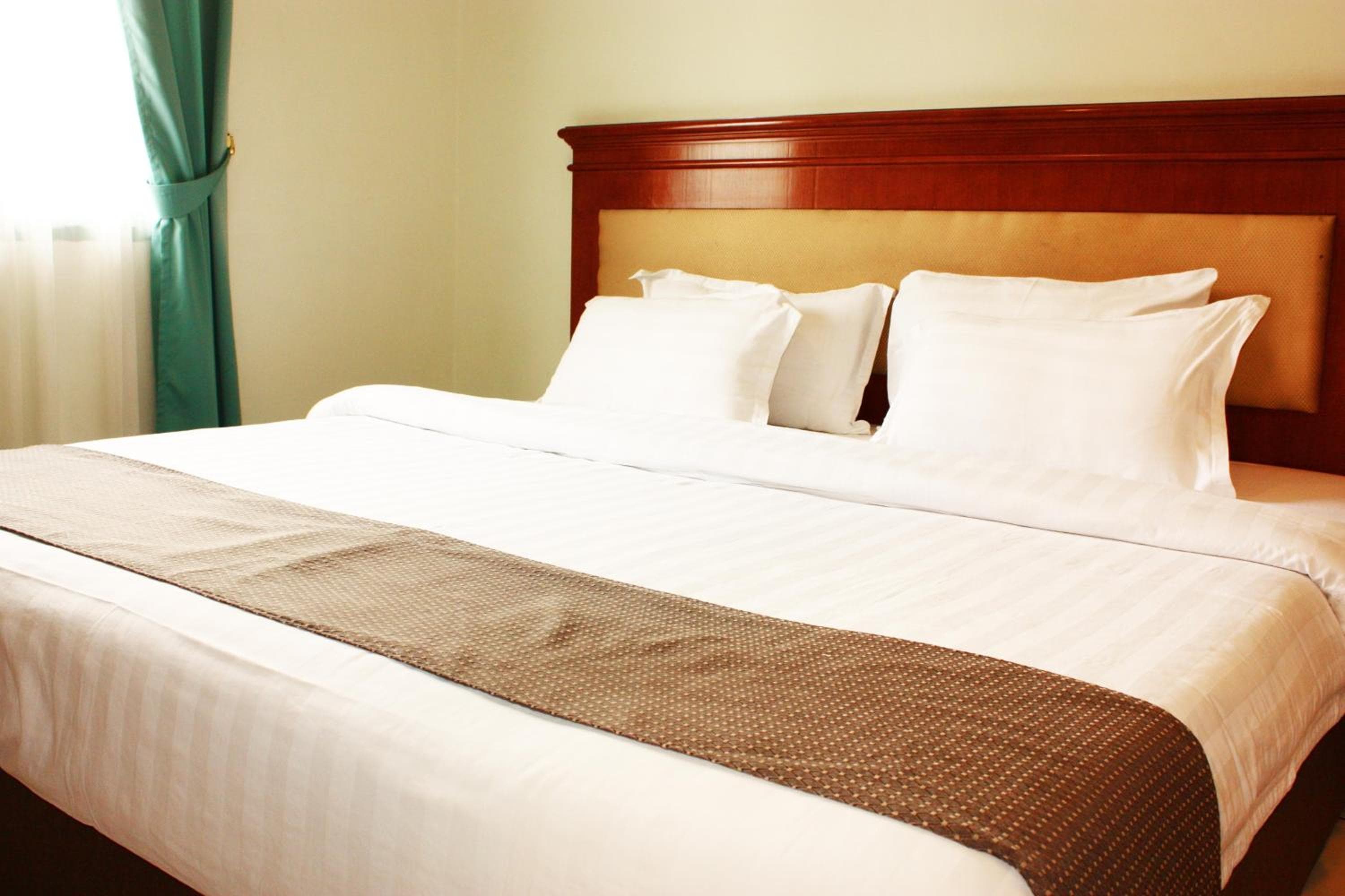 Travellers Suites Serviced Apartments
