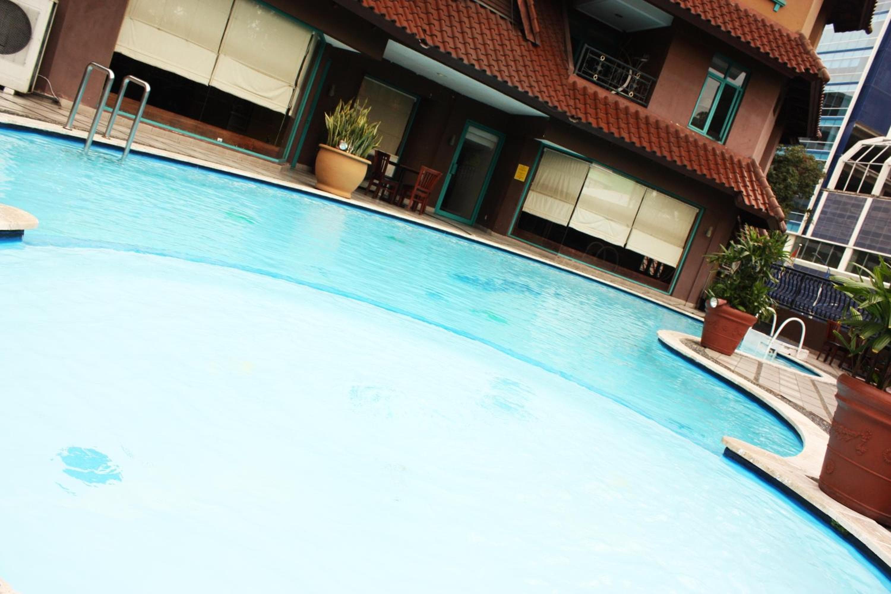 Travellers Suites Serviced Apartments