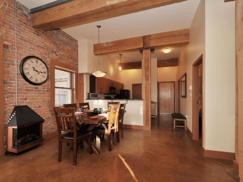 Historic Loft W Exposed Brick & Timber Beams