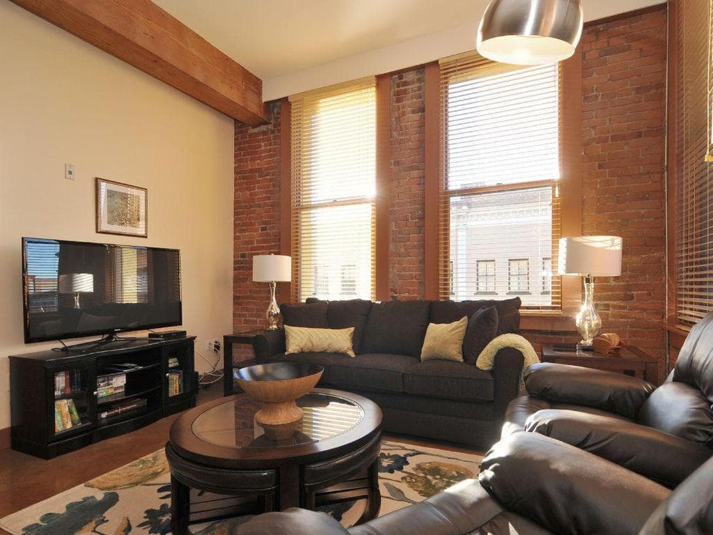 Historic Loft W Exposed Brick & Timber Beams
