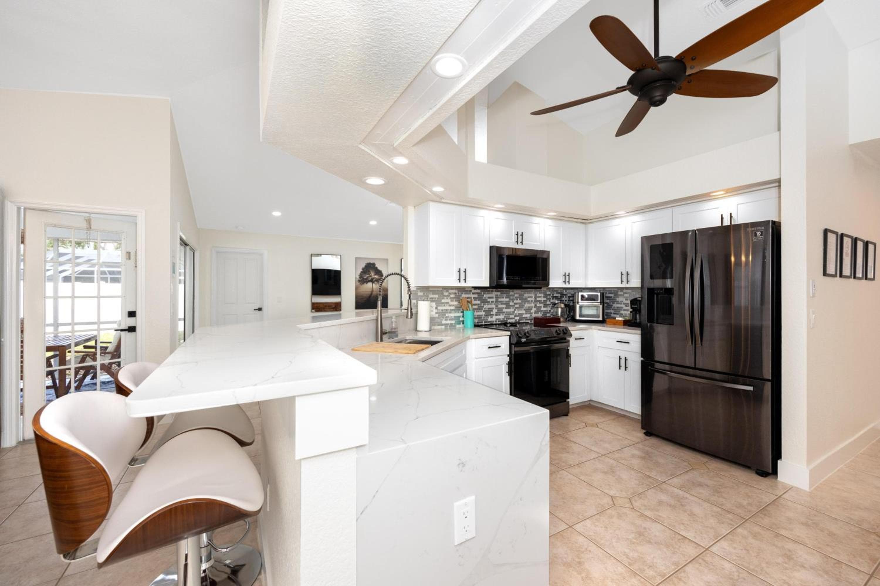14 Bright Spacious 4 Bedroom Home with a Heated Pool