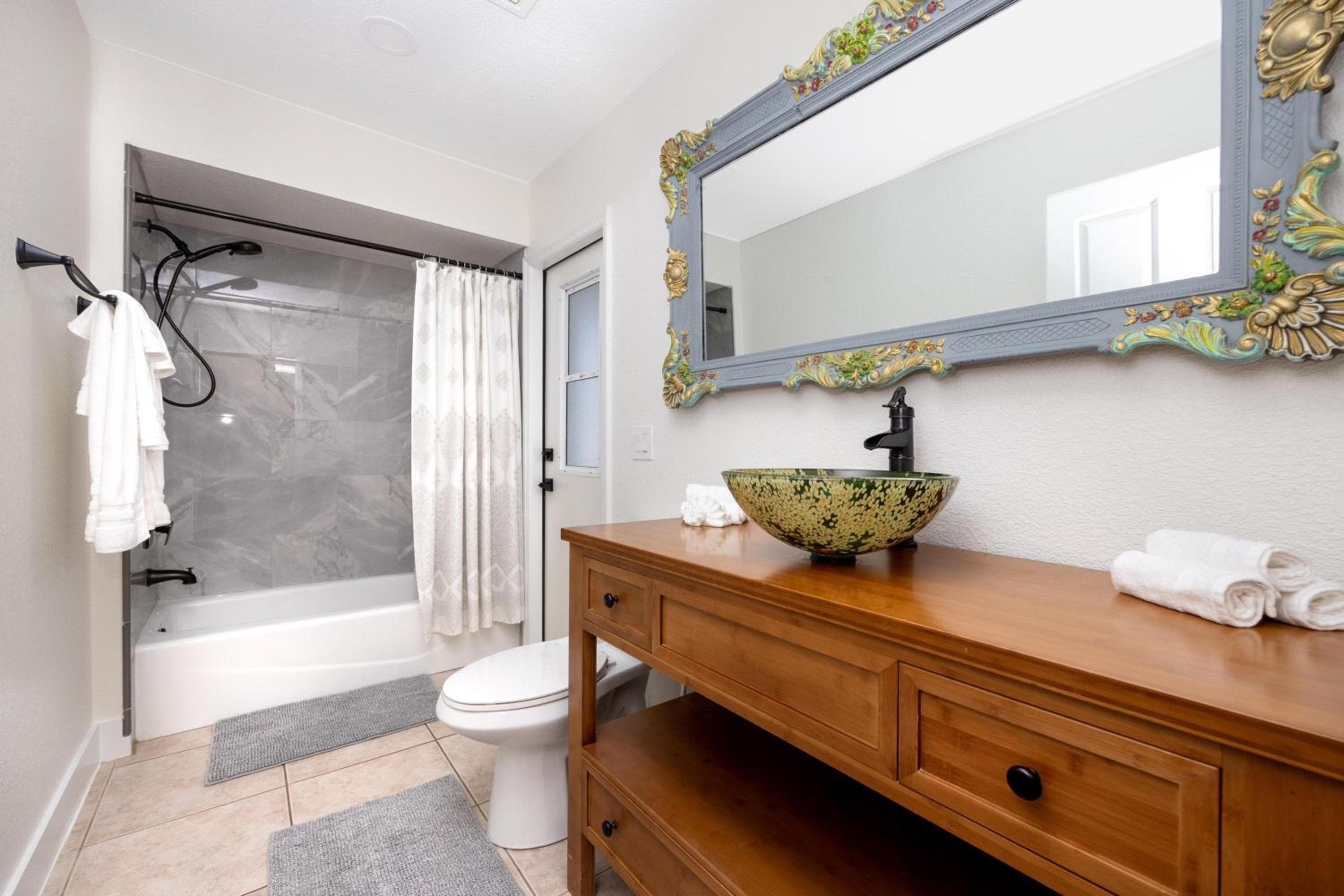 14 Bright Spacious 4 Bedroom Home with a Heated Pool