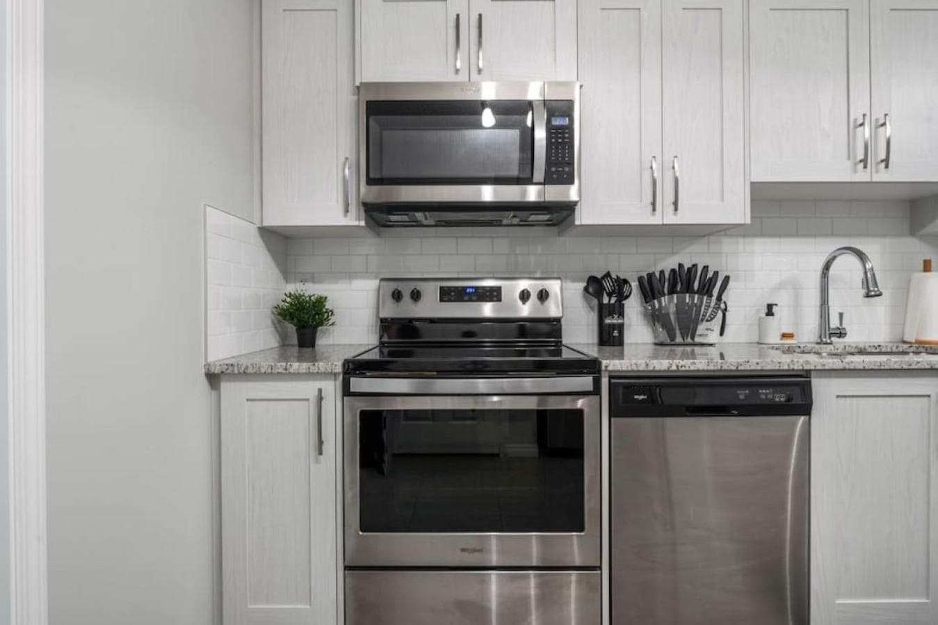 Top Rated Luxury House with Central AC, Double Garage Parking, 2 Kitchens, 5 Bedrooms & More!