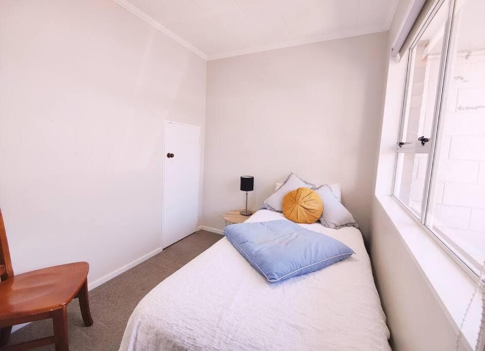 A modern 2 bedroom with private backyard, kitchen.