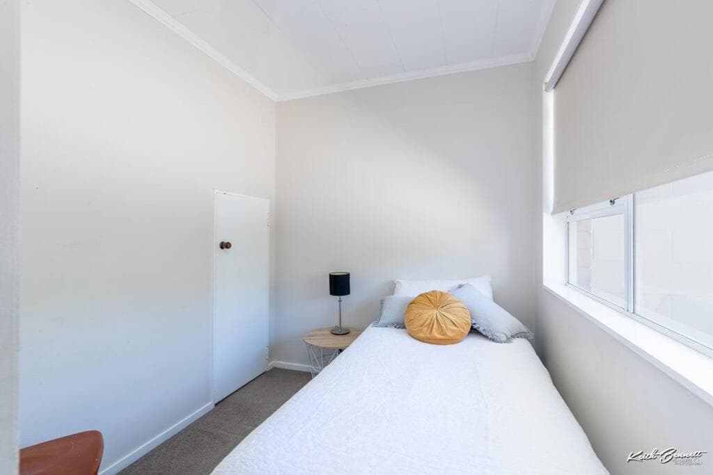 A modern 2 bedroom with private backyard, kitchen.