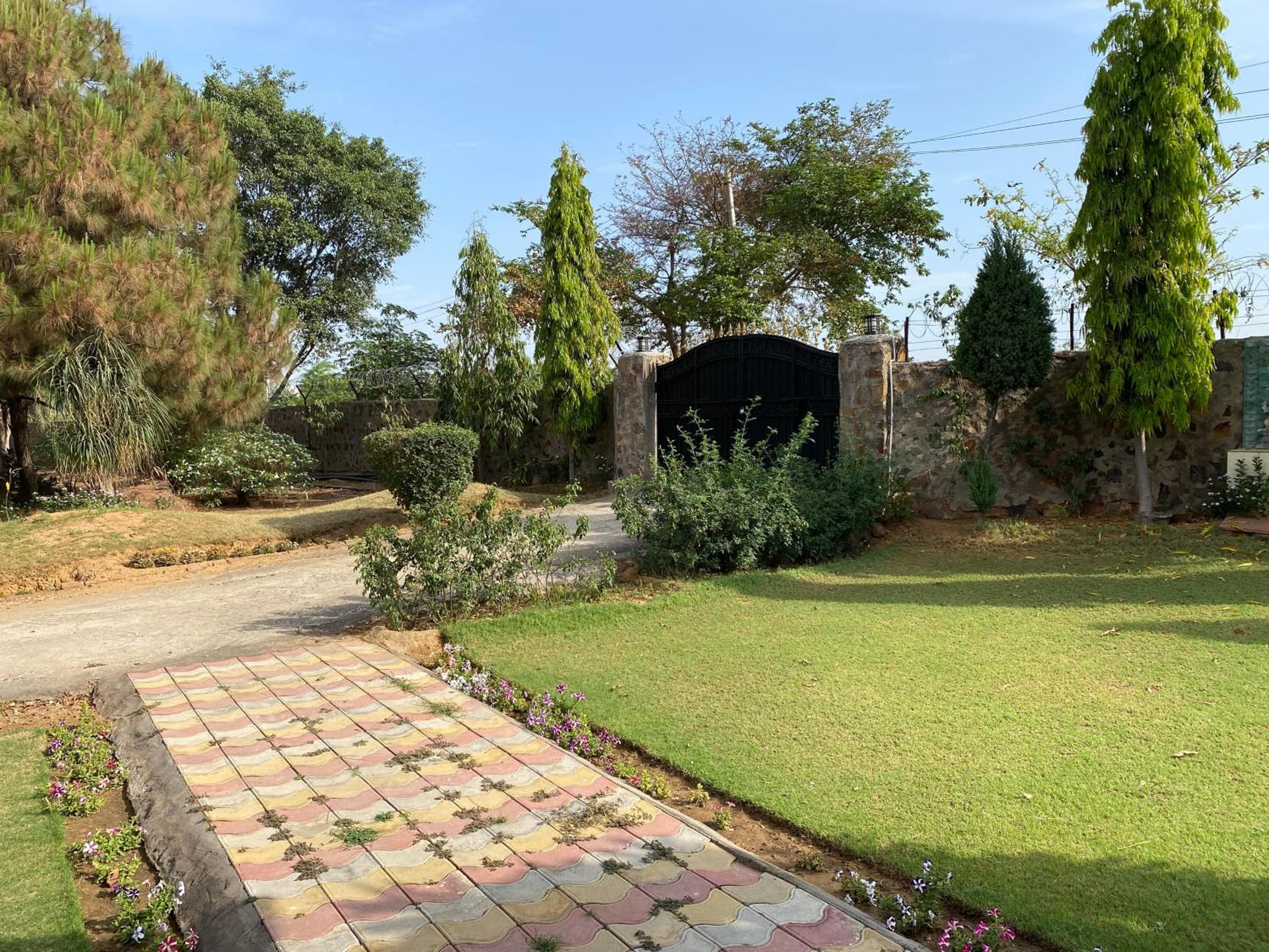 Orchard At Sarai - Luxury Tent Villas, Swimming Pool, Large lawns, & Pet friendly