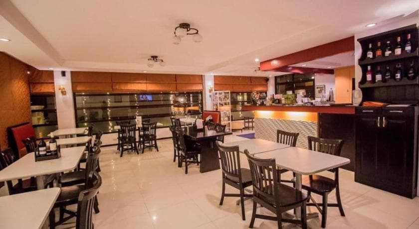 The Red Palm Suites and Restaurant