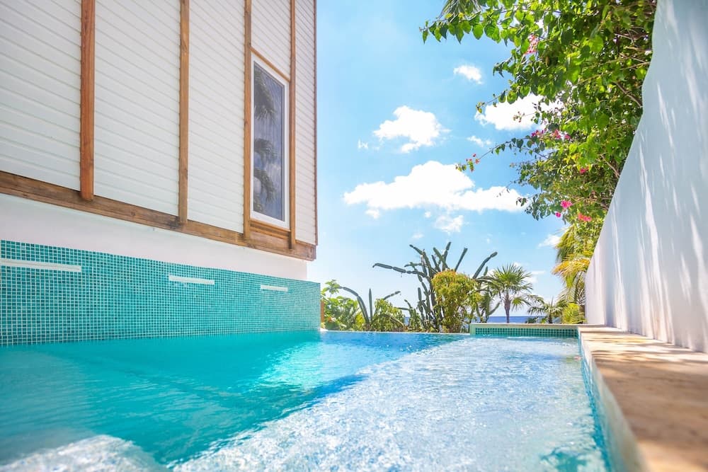 Awesome Over The Water Overlooking West End - Aire Agua 3 Bedroom Home by RedAwning