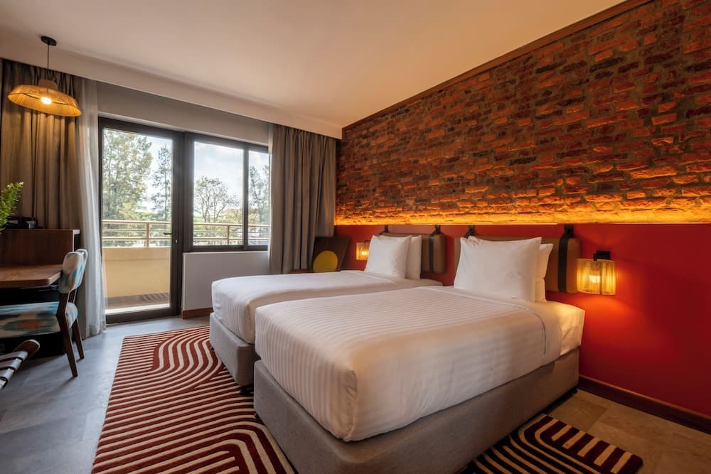 Zaria Court Kigali, Tapestry Collection by Hilton