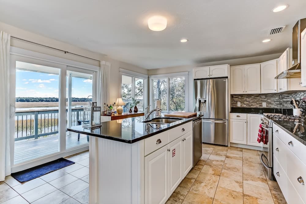 Open Floor Home with Marsh Front Deck and Breathtaking View by RedAwning