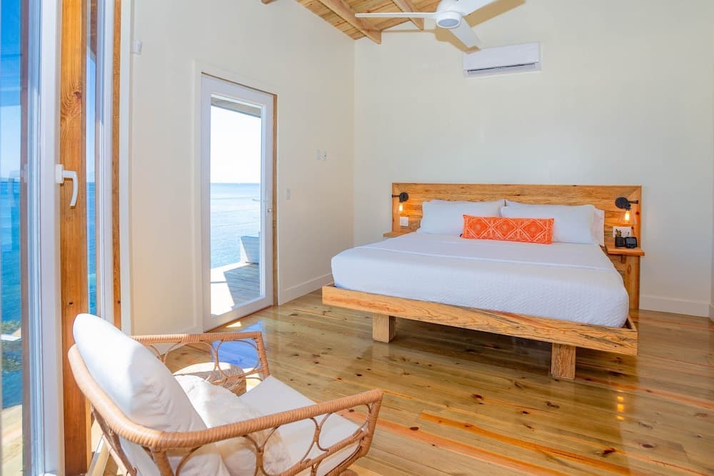 Awesome Over The Water Overlooking West End - Aire Agua 3 Bedroom Home by RedAwning