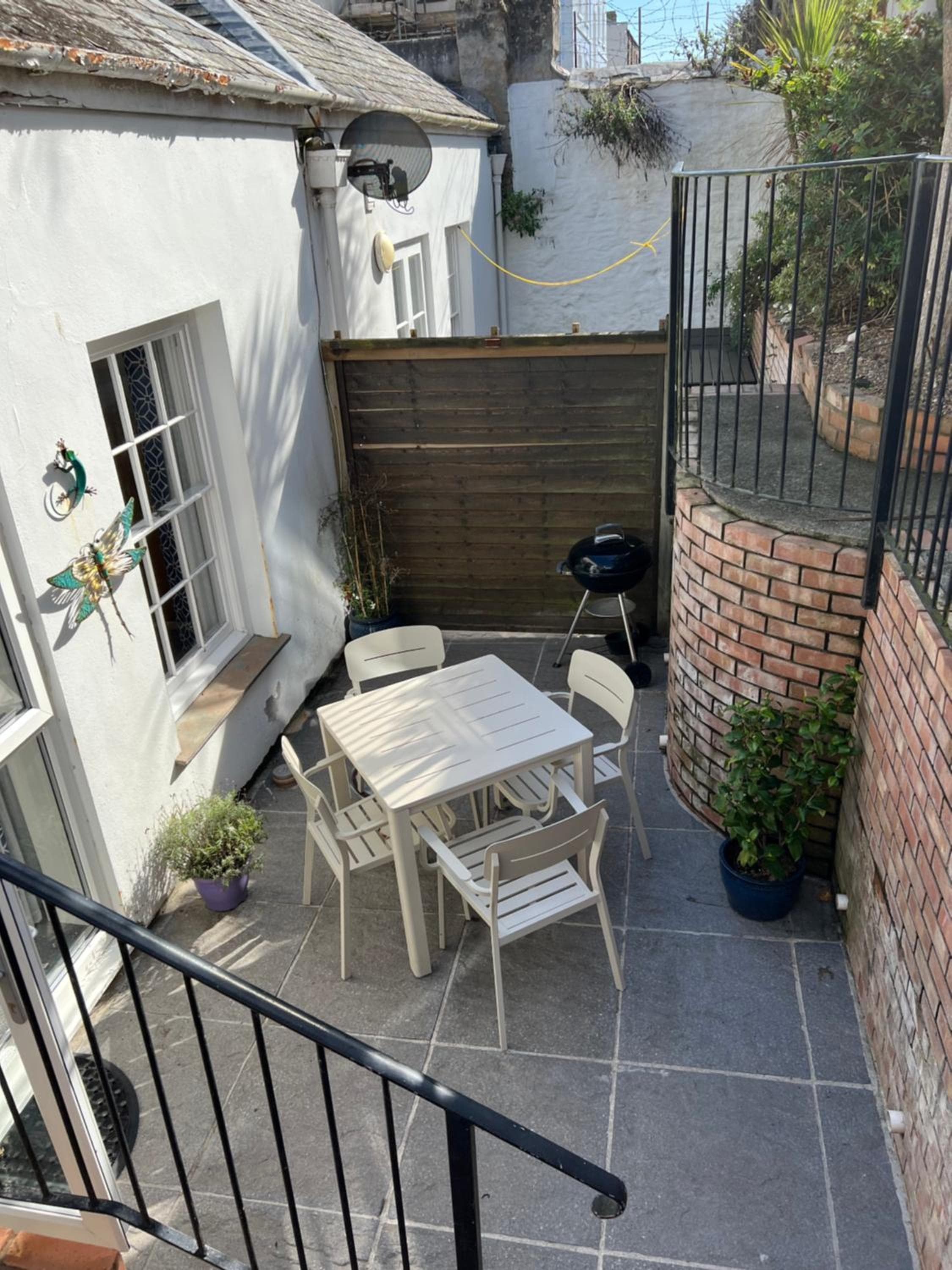 Central Falmouth with parking & courtyard