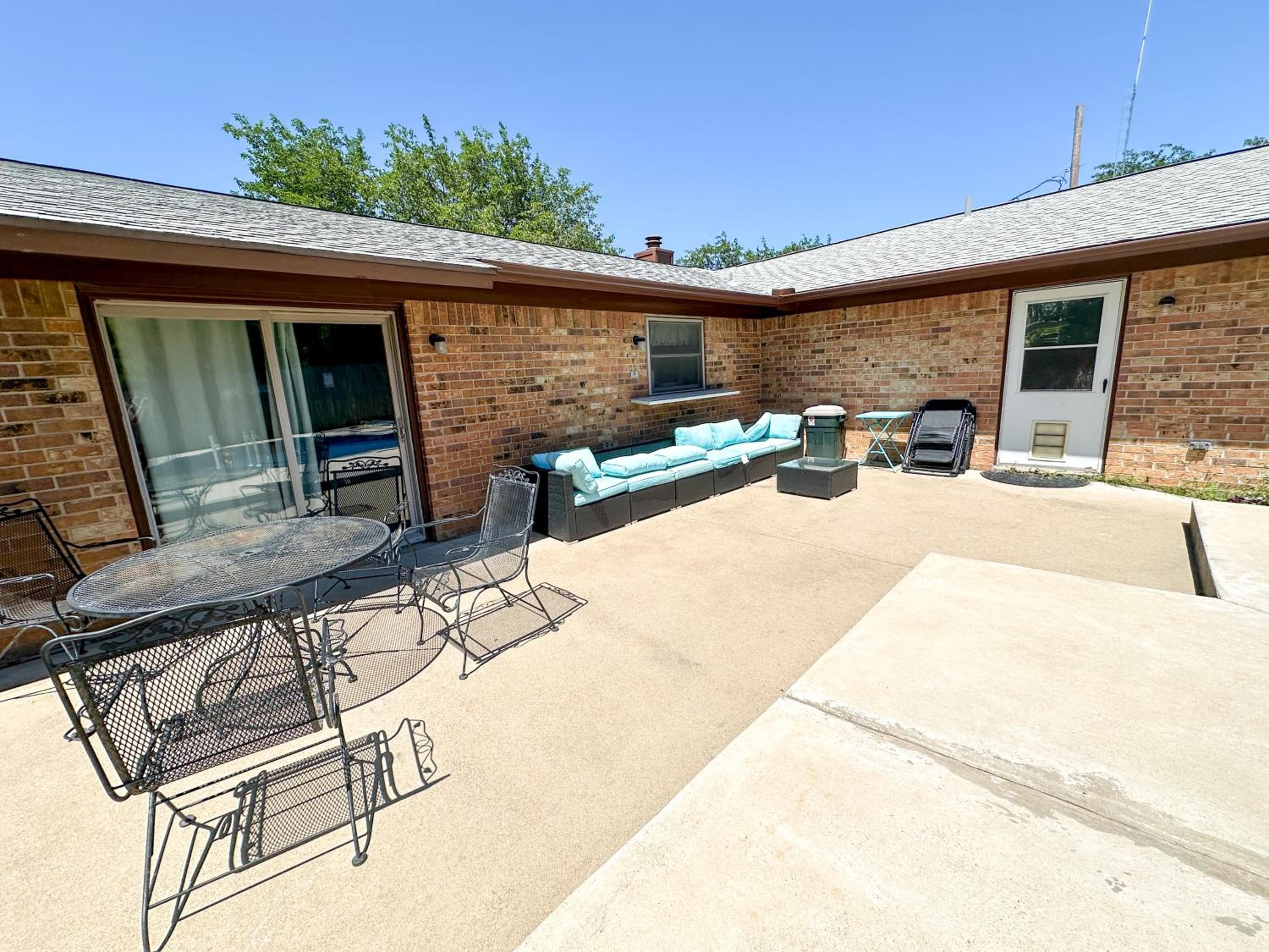 TX Speedway Studio: Desk + Cowboy Dipping Pool by Vacation Your Way