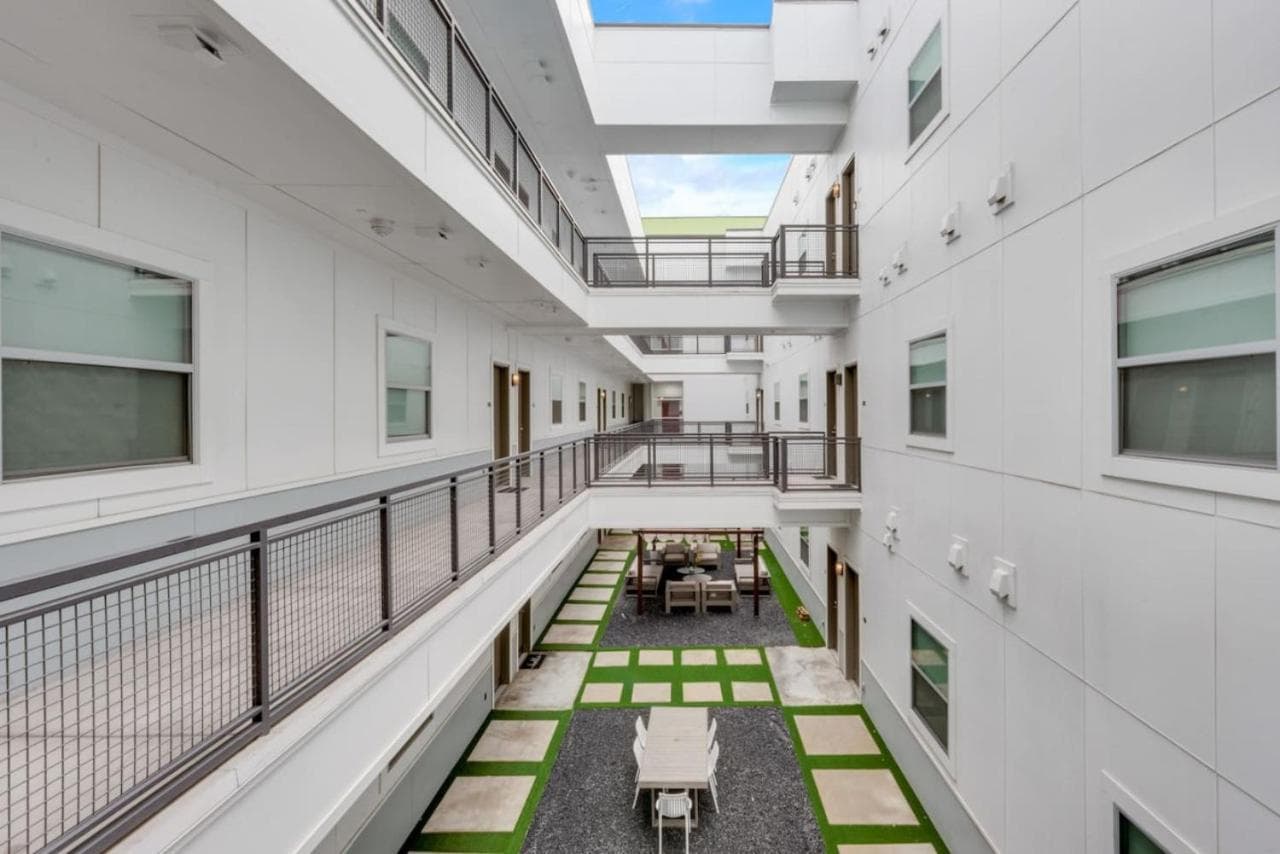 Sleek loft style 2BR I Gym I Parking I Workspace